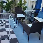 на център *